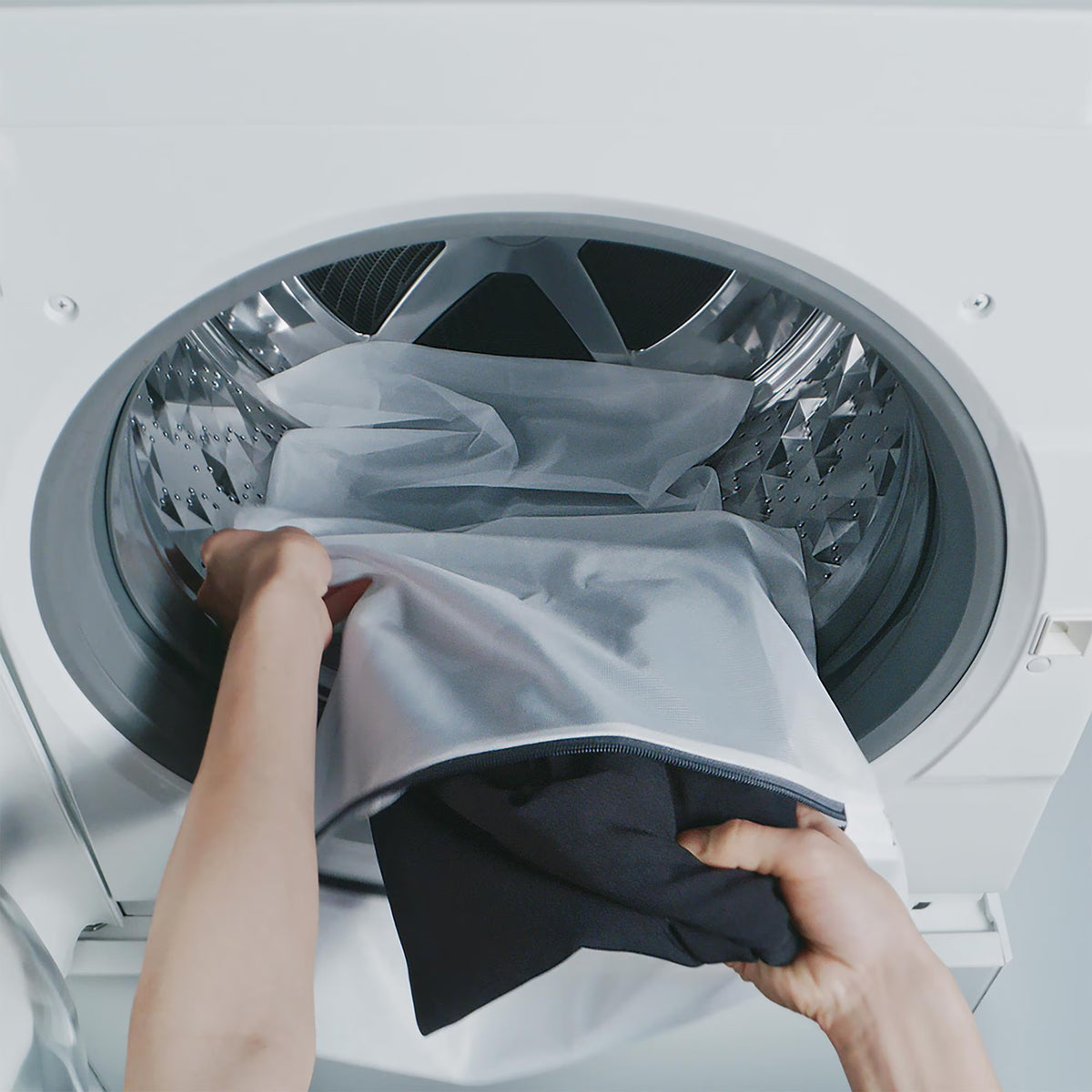 UNIQLO 男款 HEATTECH 極暖喀什米爾發熱衣洗滌示意圖